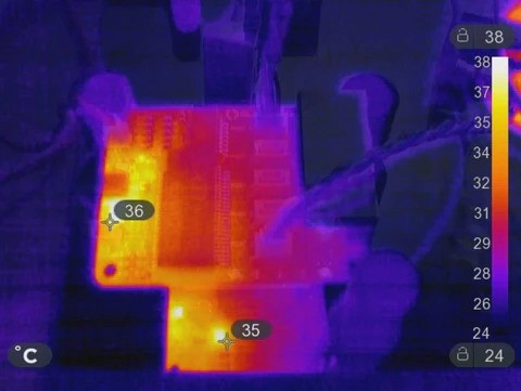 Thermal image at 30V input: board hotspots at 35–36°C