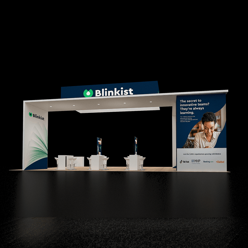 30x40 branded island exhibit with customer meeting space and product display zones