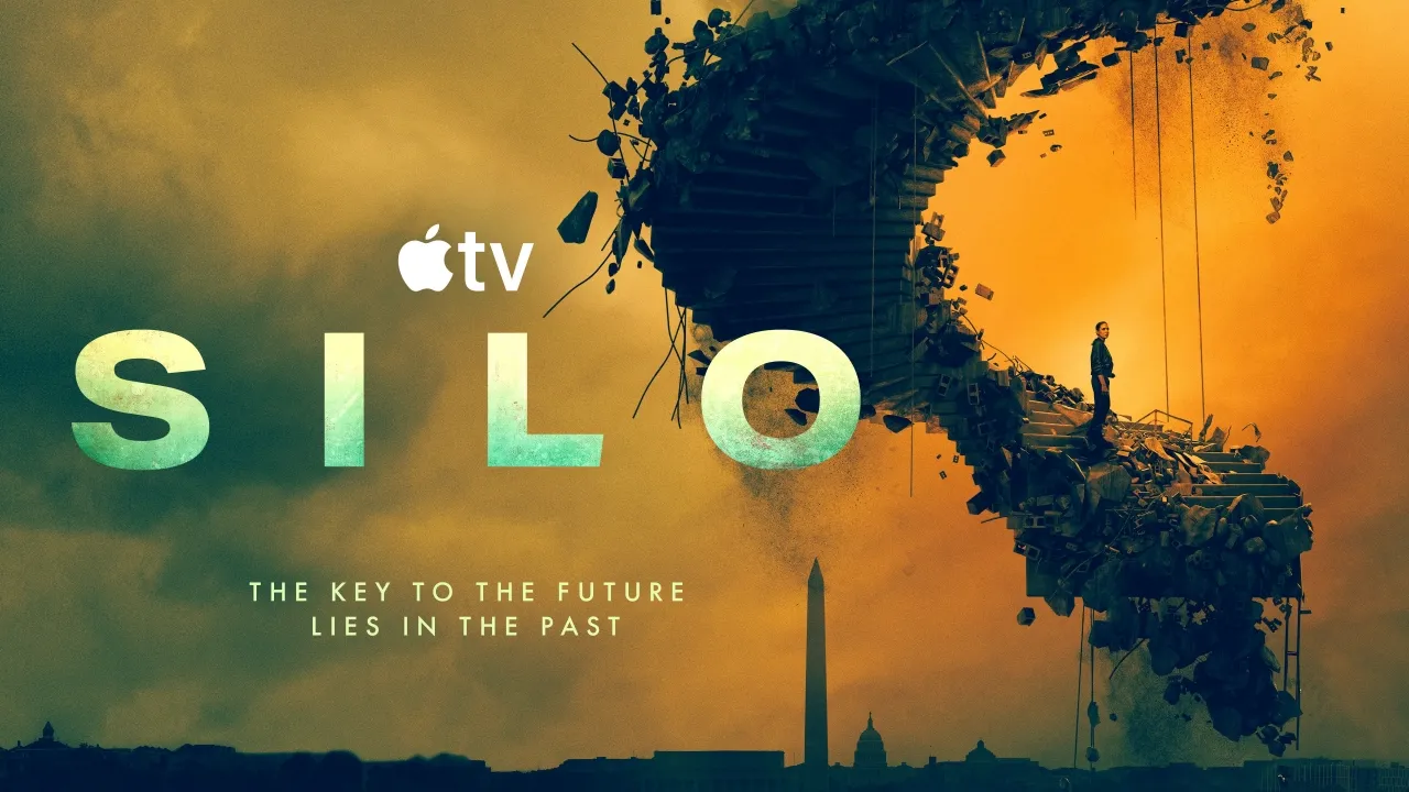 A lone figure stands on a spiralling, debris-filled structure resembling a skull, set against a dramatic orange sky with the Washington Monument in silhouette, accompanied by the text "Silo" and the tagline "The key to the future lies in the past," highlighting themes of mystery and exploration in this Apple TV promotional poster.