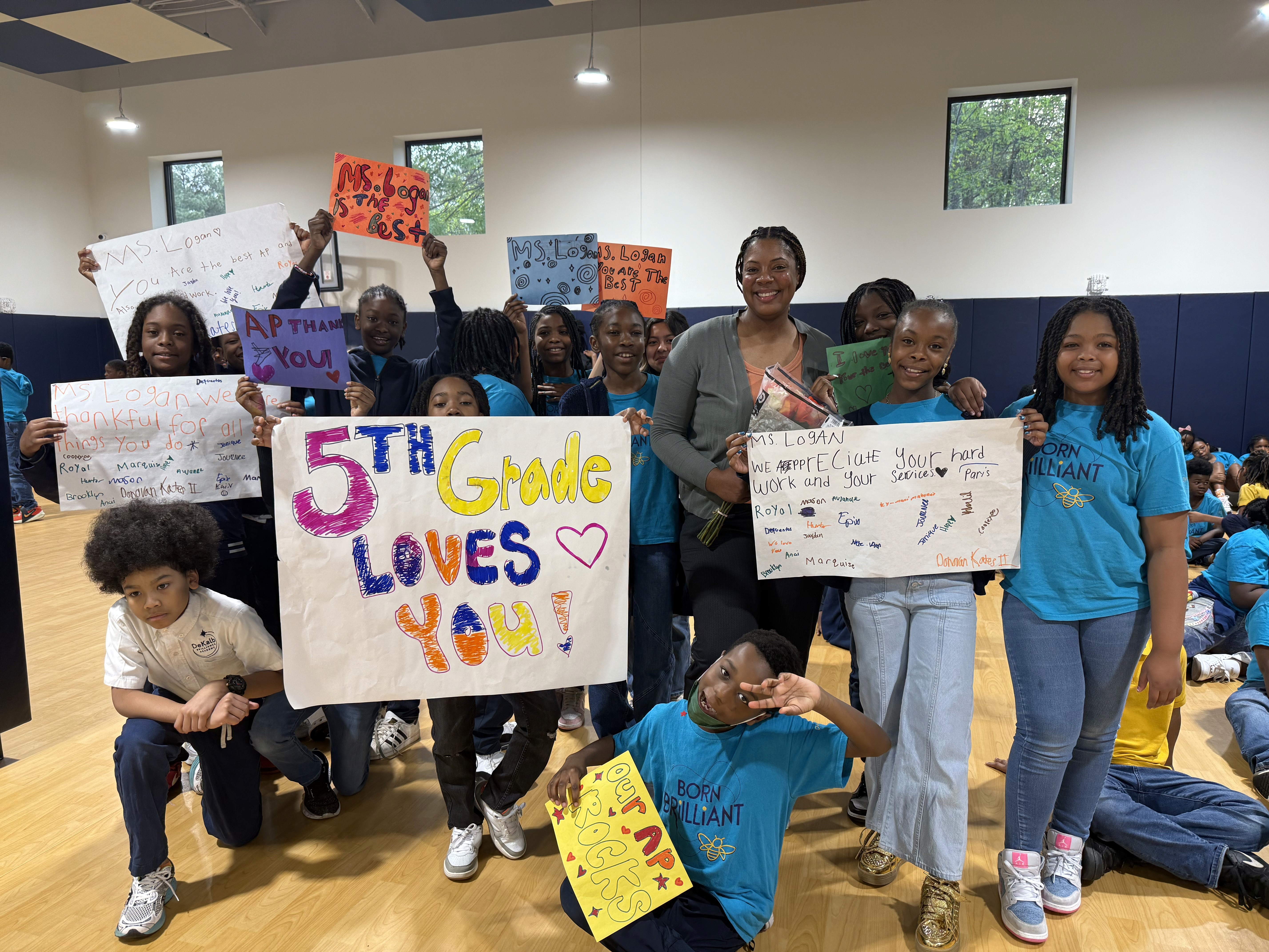 Tiayana Logan with Legacy Rise Academy scholars