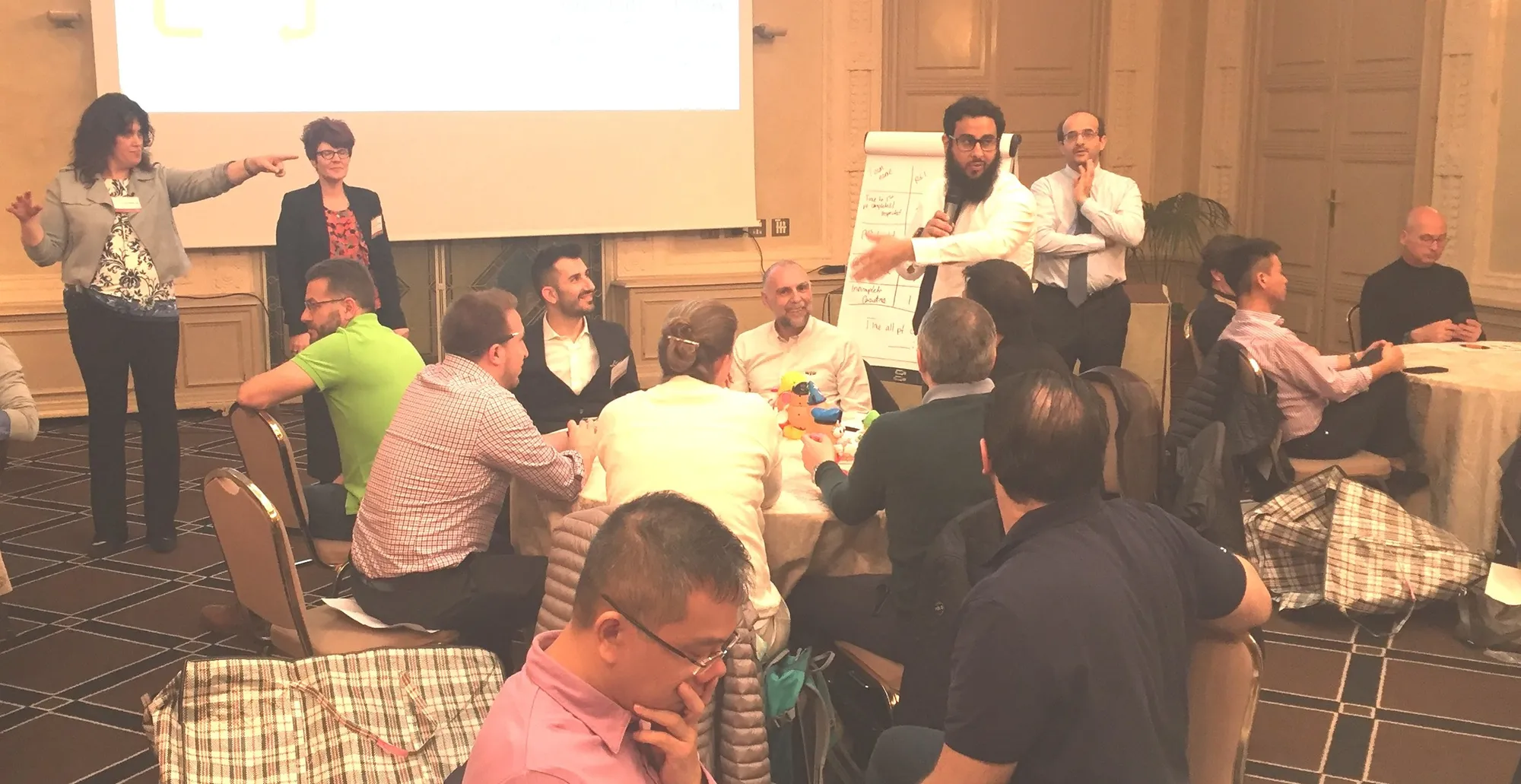 Participants working through cases at an EQuIP workshop