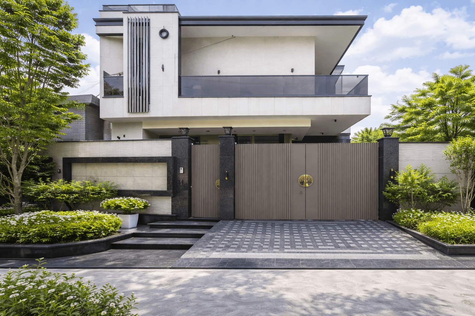 Modern residential home with patterned stone driveway and exterior paving in Ghaziabad