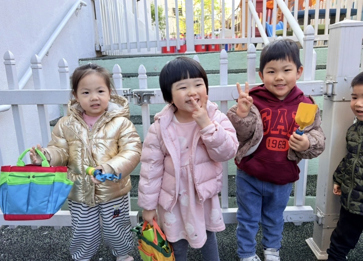 Cute preschoolers in the garden