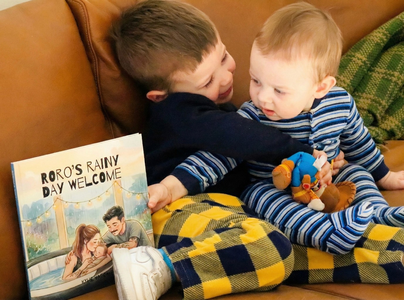 Close-up of a dark green leaf showing its textured surface and central vein against a muted background.
