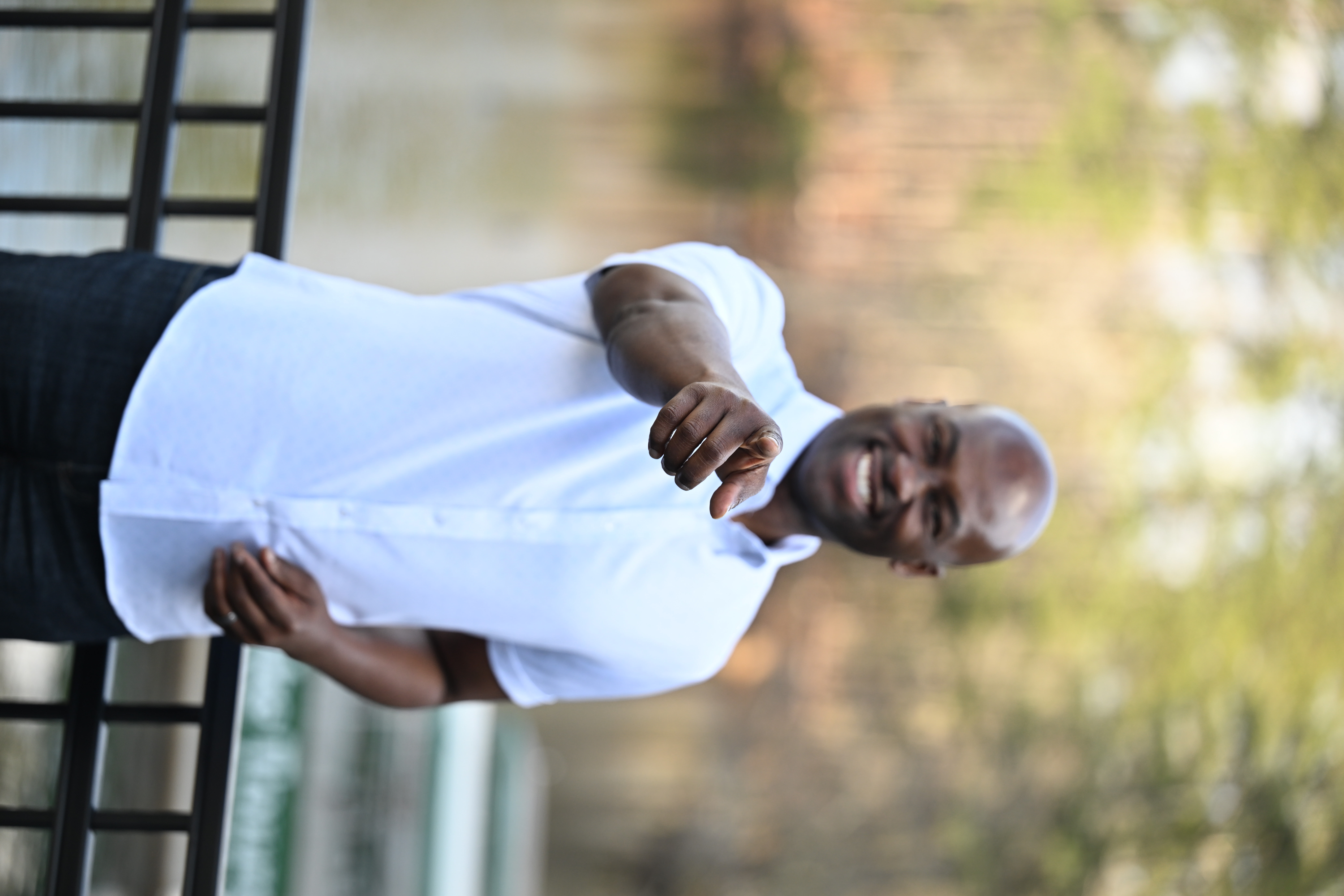 person sitting in a chair in front of a man