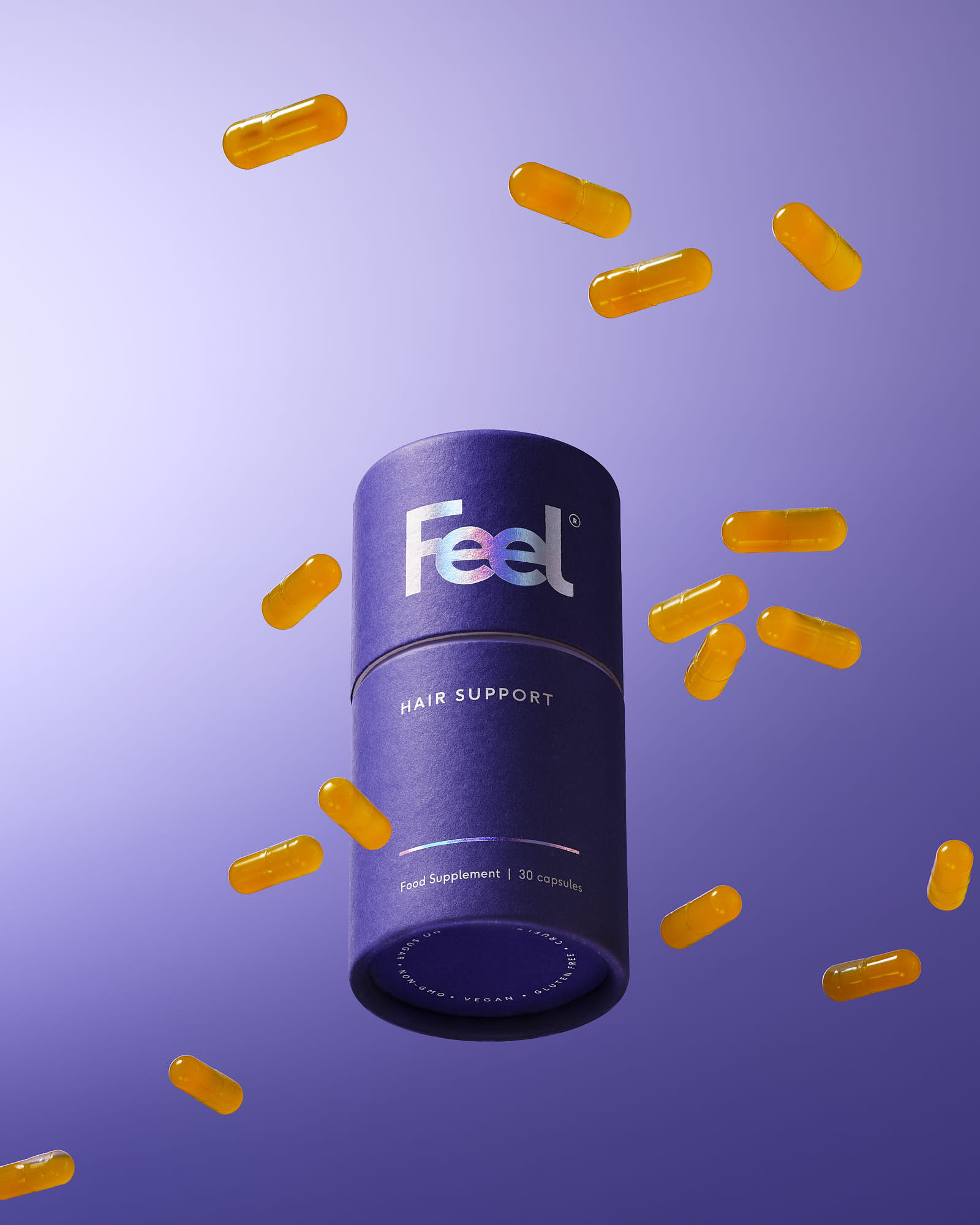 A purple cylindrical container against a gradient background, surrounded by orange confetti-like pieces.