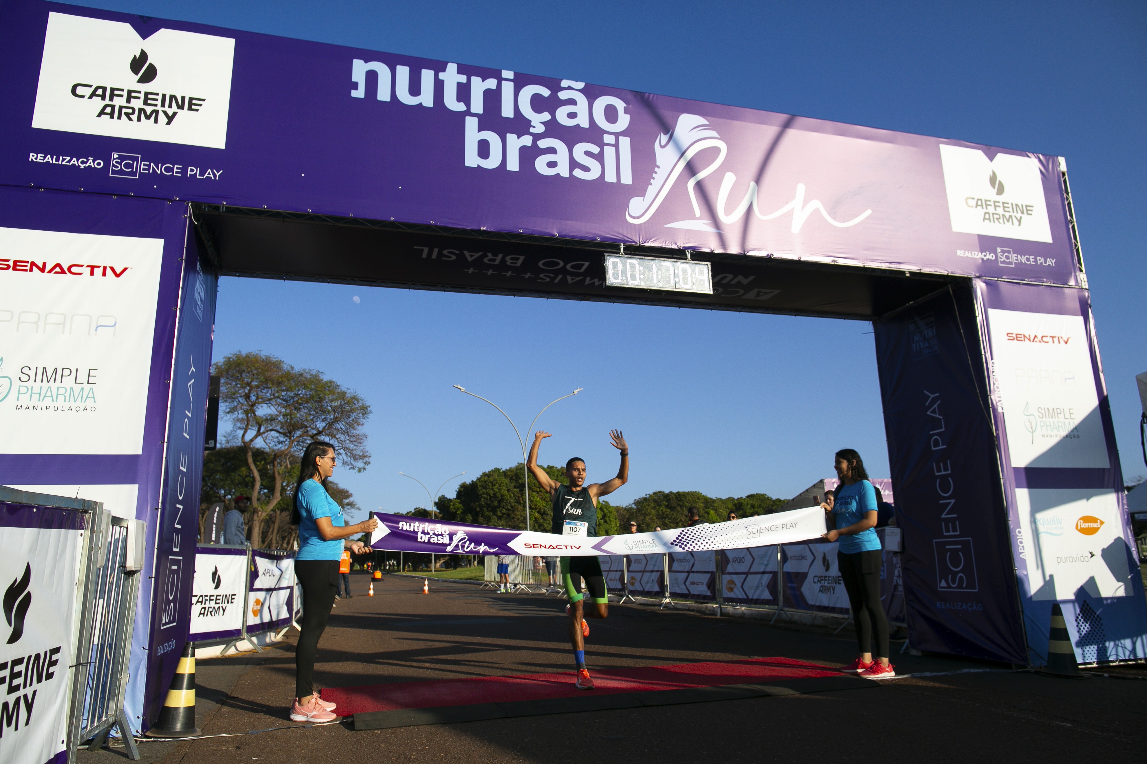 Young Men Looking at the Laptop Screen and Smiling