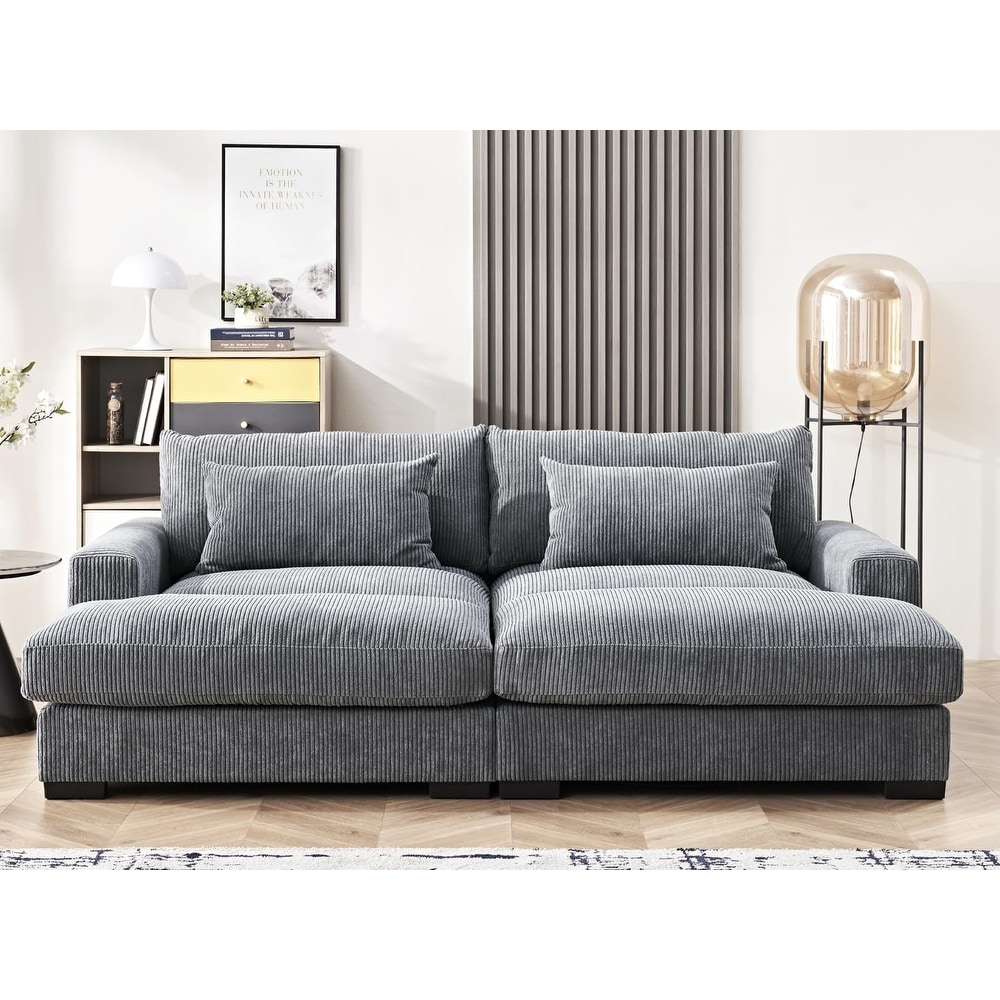 Luxe corduroy sleeper sofa featuring soft upholstery and a spacious design, perfect for relaxing or accommodating guests.