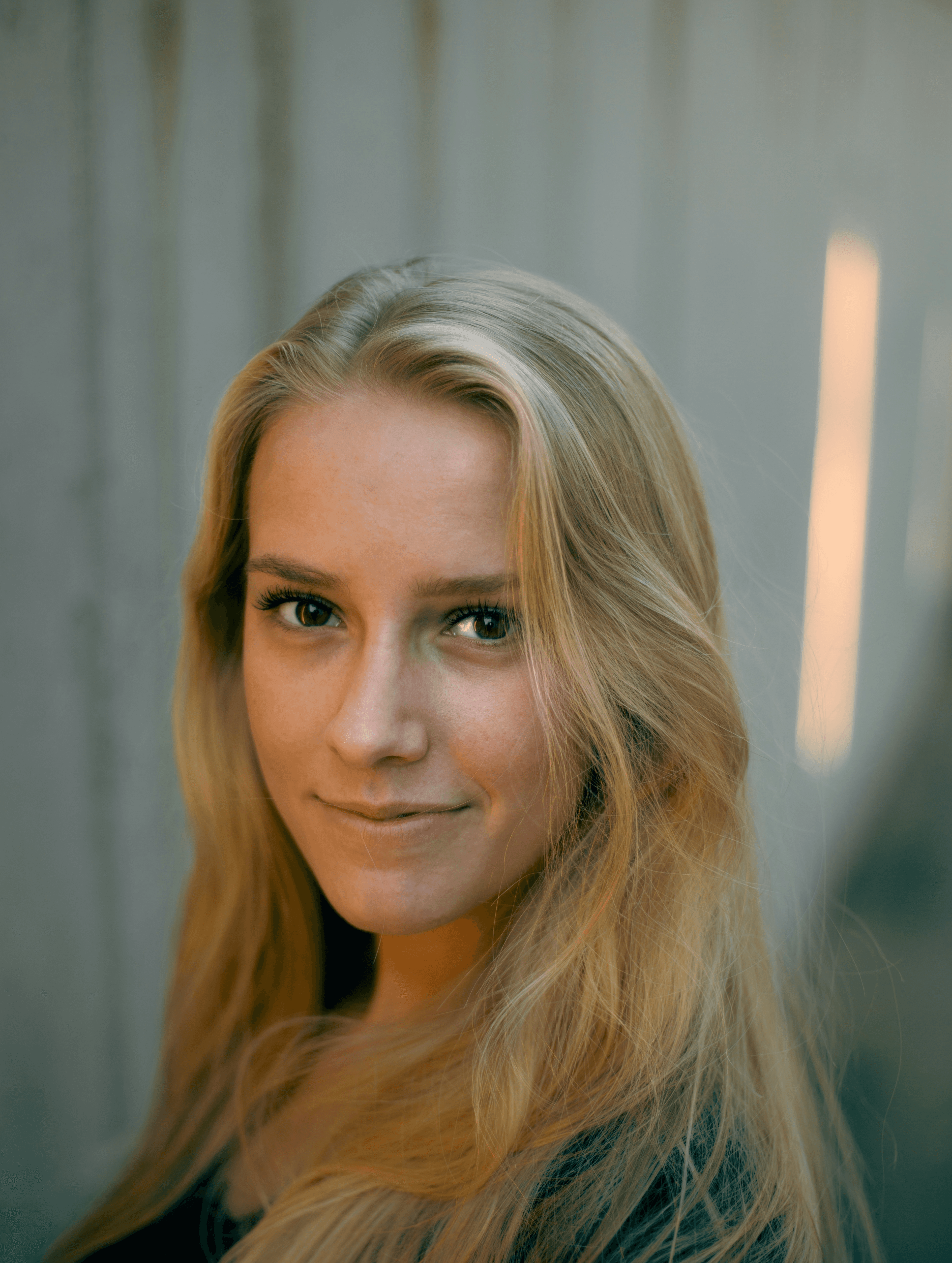 woman in black shirt smiling