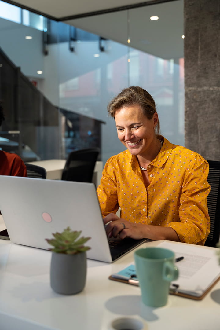 Business woman working in office environment