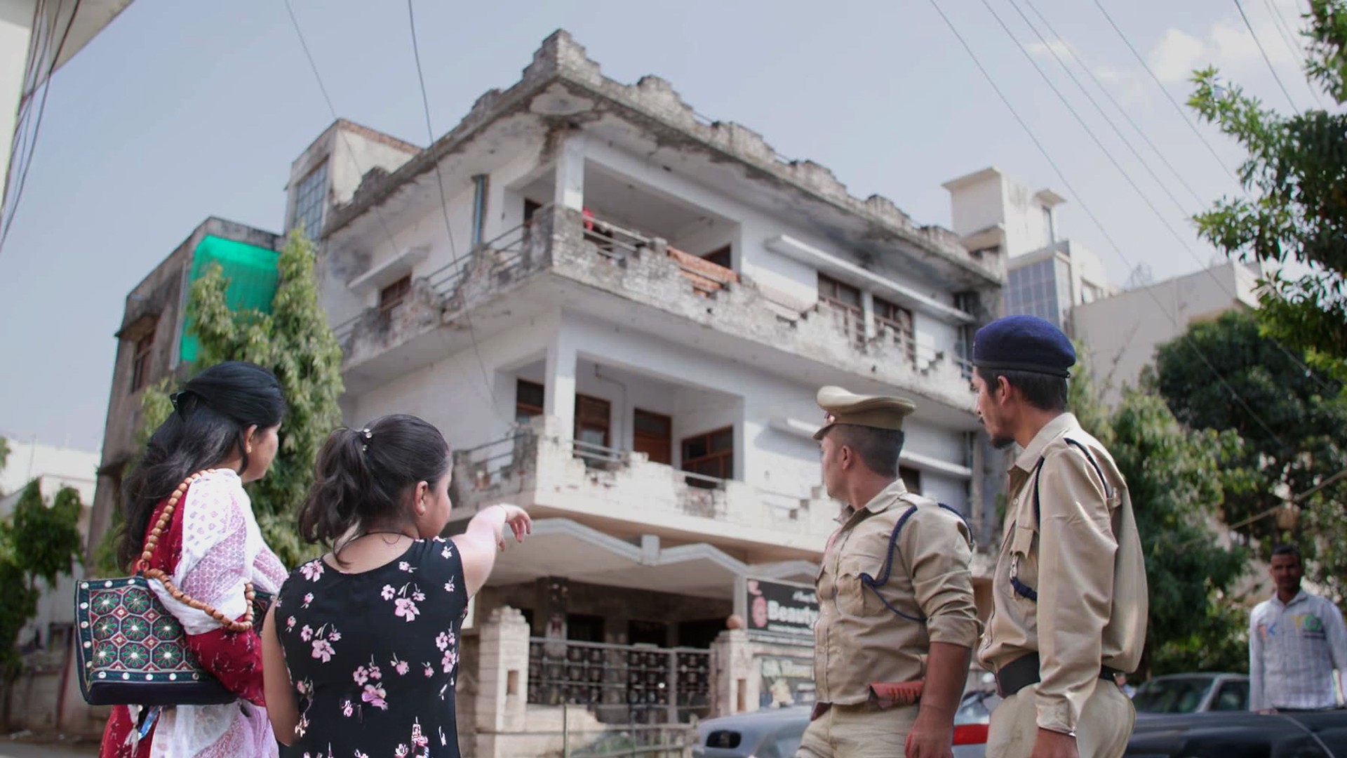 Awareness film scene depicting risks of trafficking and coercion, part of the 1090 Women and Child Helpline campaign.