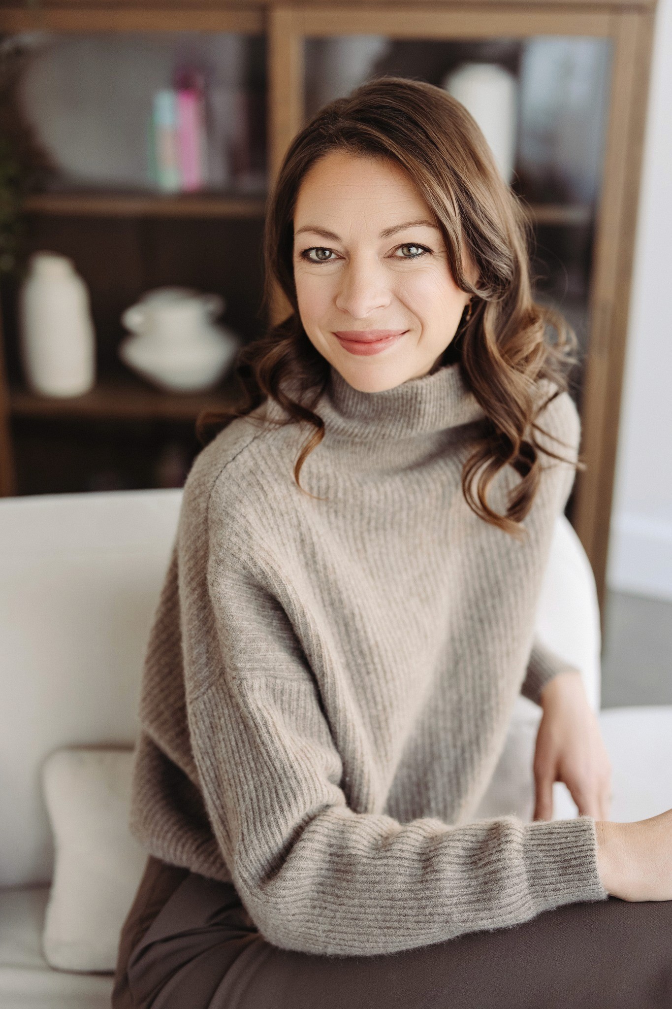 Portrait bienveillant d'Andréanne Martin illustrant l'accompagnement humain et l'expertise personnalisée offerts aux membres du programme.