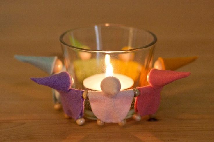 A close-up view of dark green leaves, creating a lush, textured background with subtle variations in color.