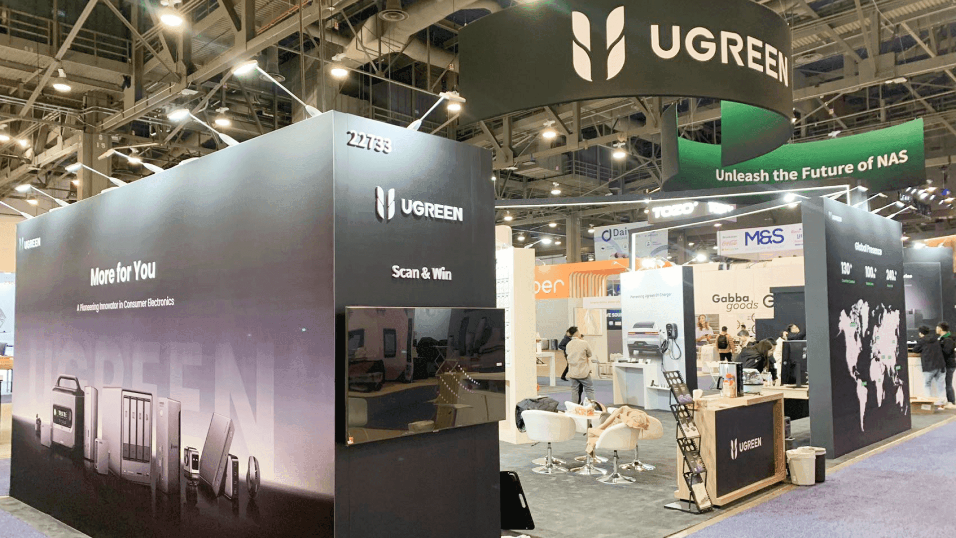 Data center infrastructure booth at Mandalay Bay Las Vegas set with screen demo and conversation-led meeting area