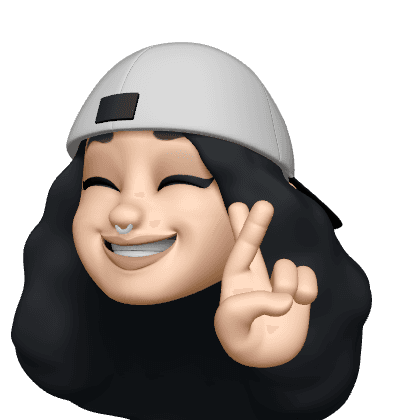 Smiling Memoji making a peace sign