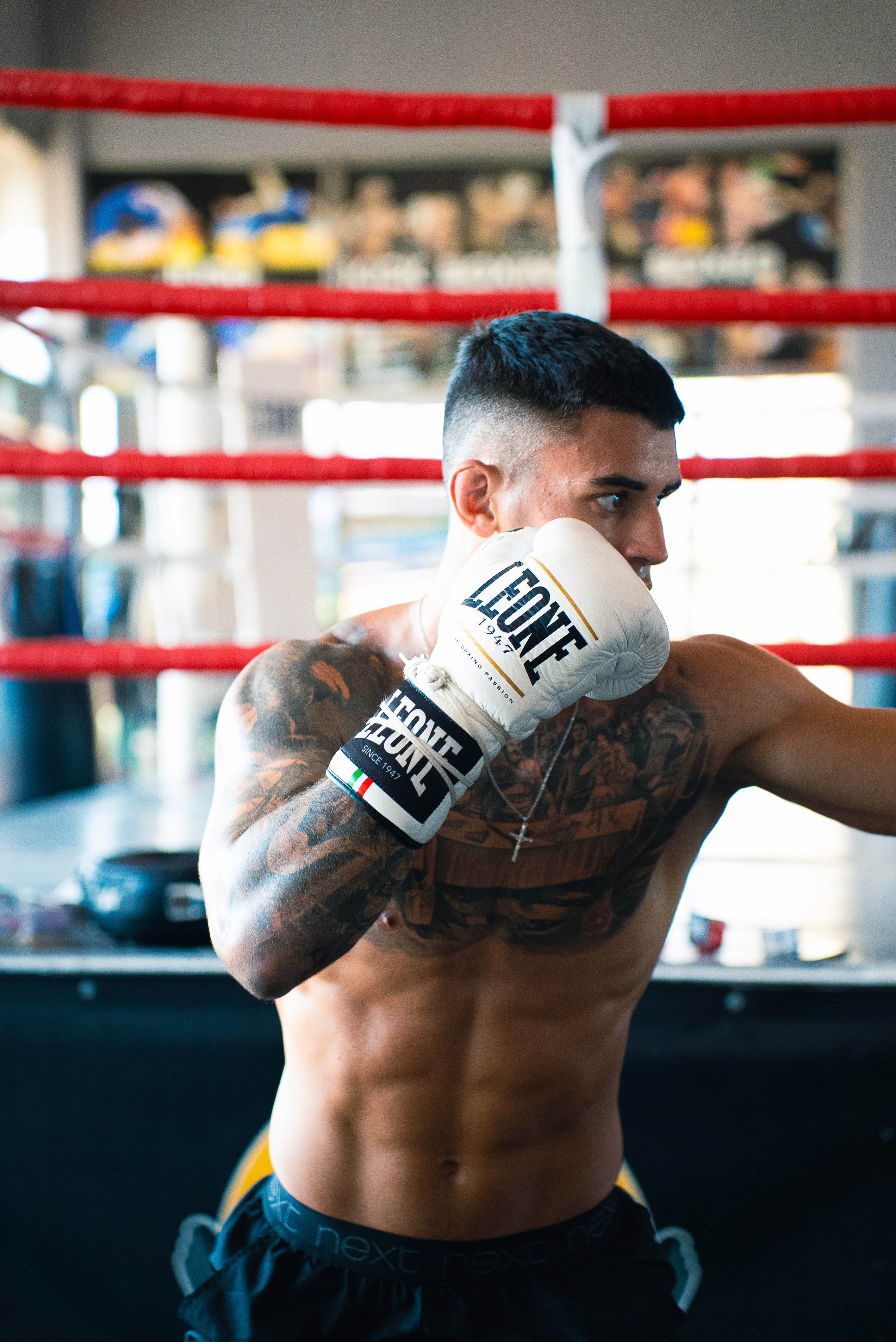  A woman in a helmet with a light trail, suggesting movement or speed in a dynamic outdoor setting.