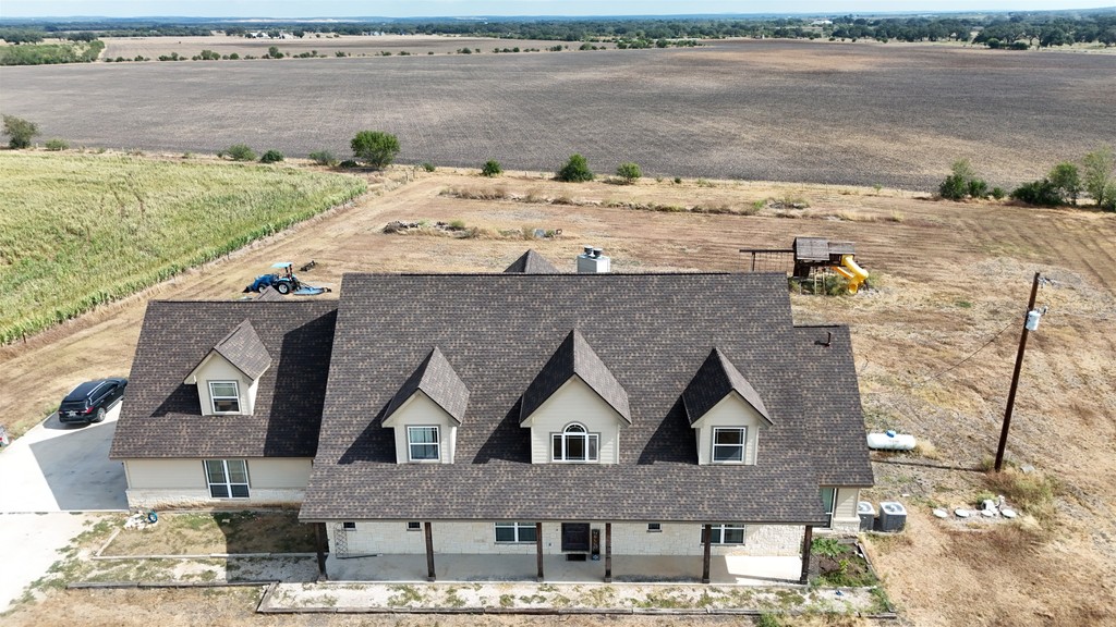 Finished front view of the Hondo home with GAF Timberline HDZ shingles in Chestnut Valley, September 2026.