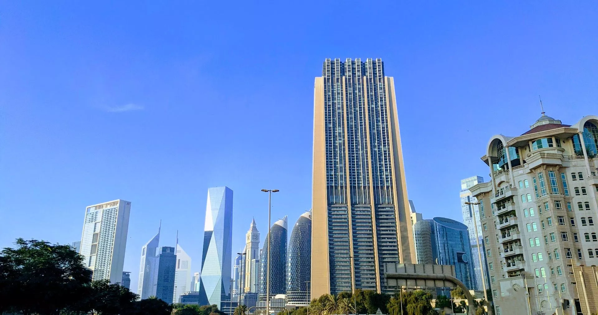 Architectural low-angle shot of Index Tower, perfect for real estate listings in Dubai’s financial district.