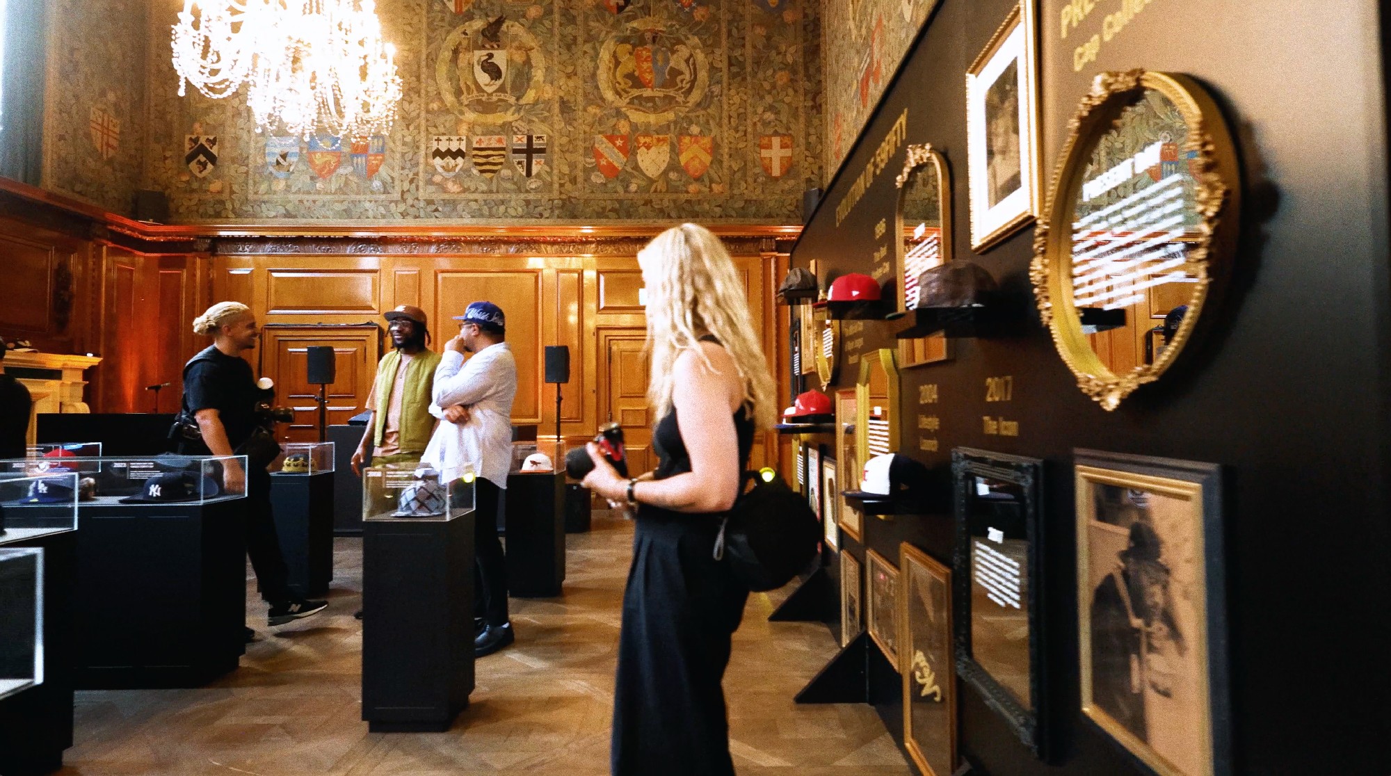 Guests gathered within the immersive 59FIFTY anniversary event space, surrounded by curated displays
