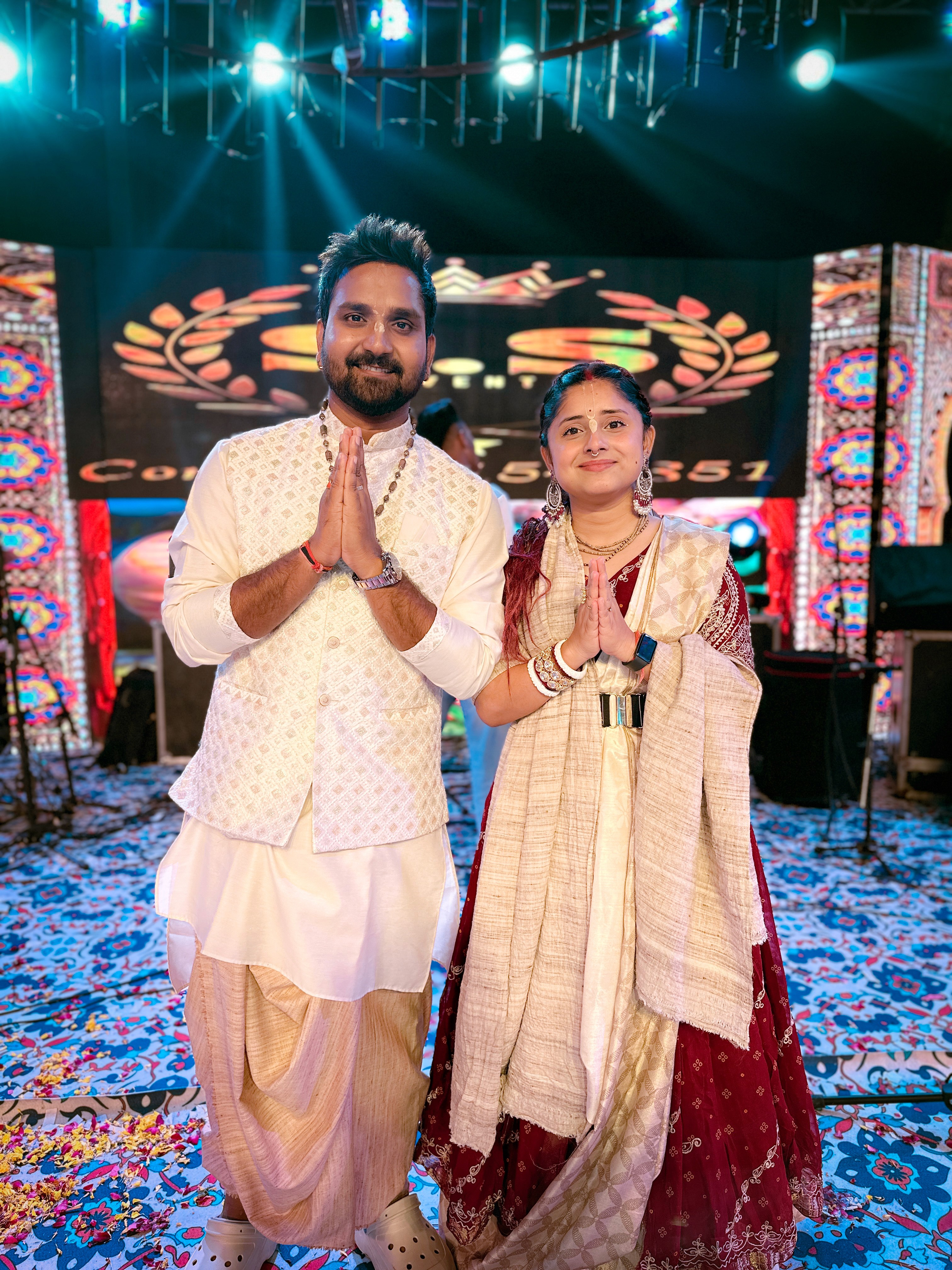 Man wearing sunglasses and headscarf in low light