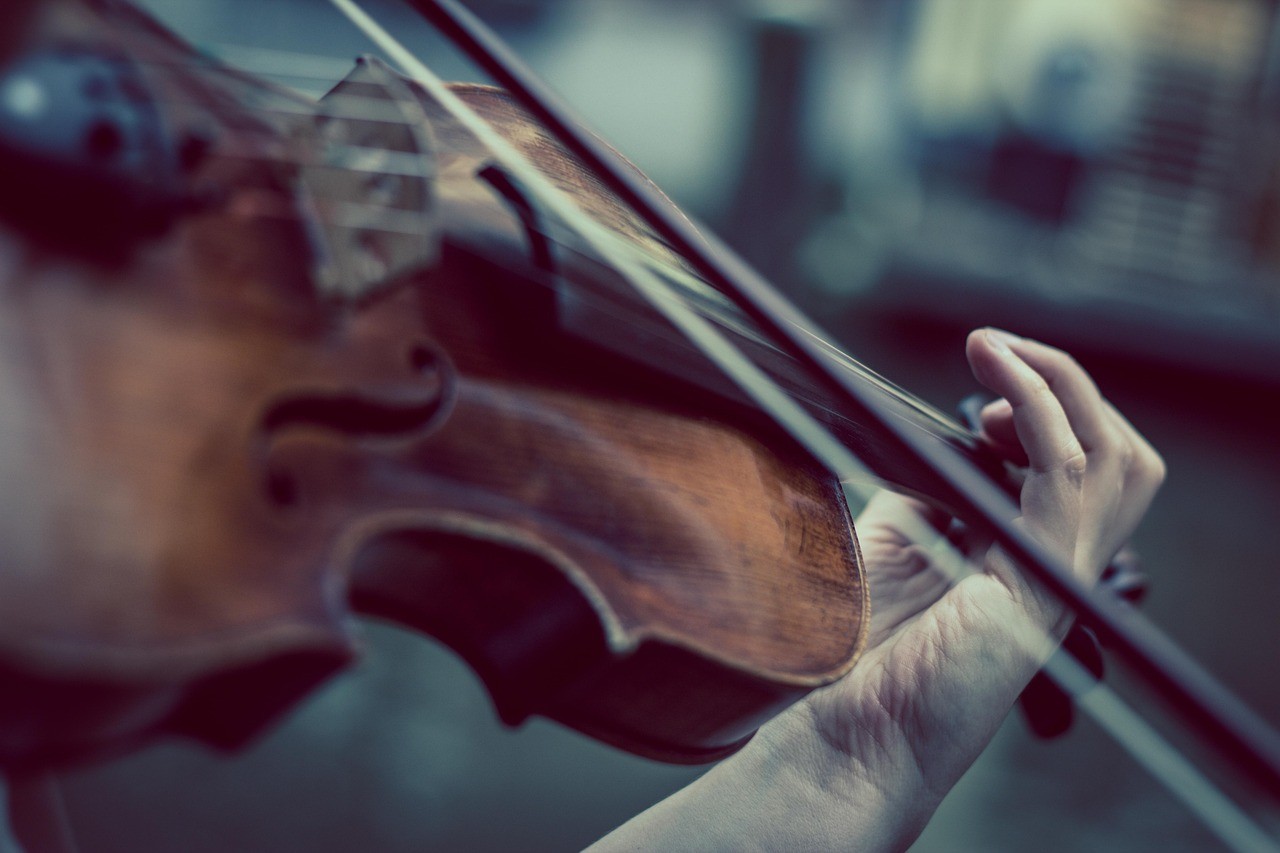 Orchestra through delicate strings