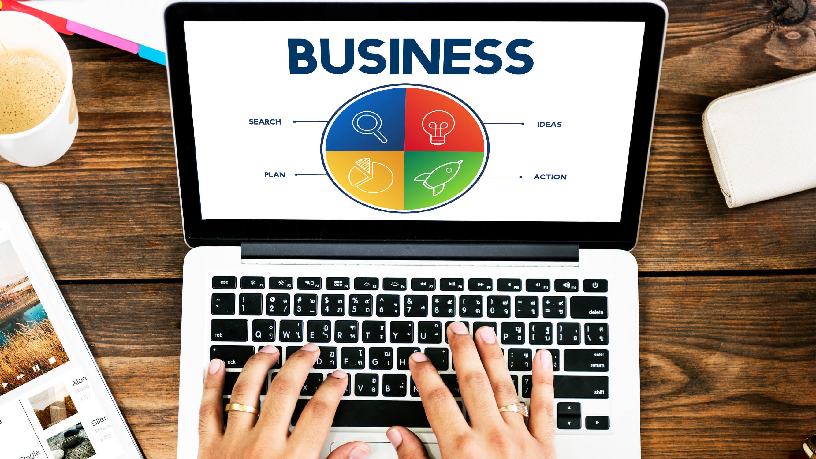  Hands typing on a laptop