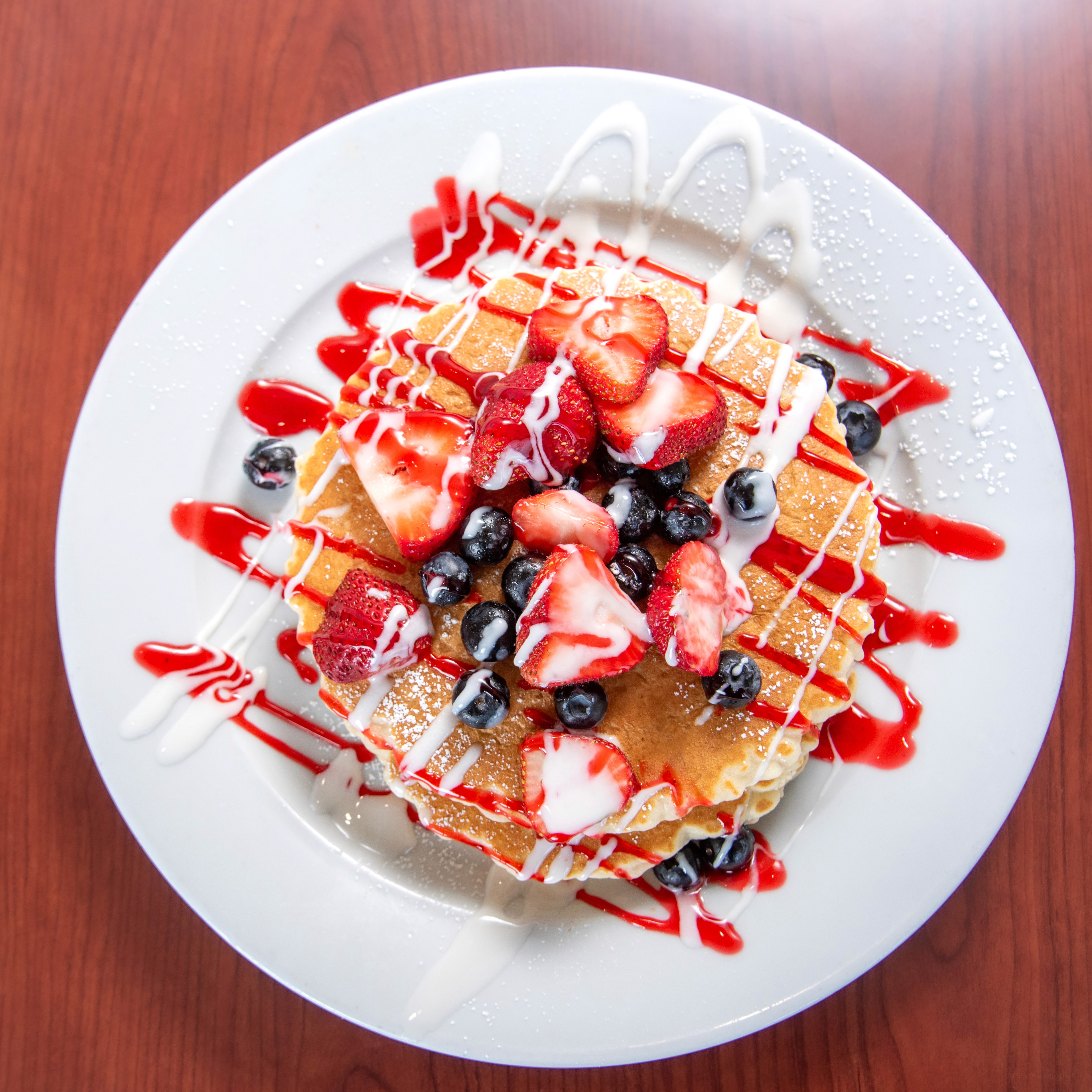 a white plate topped with eggs and toast