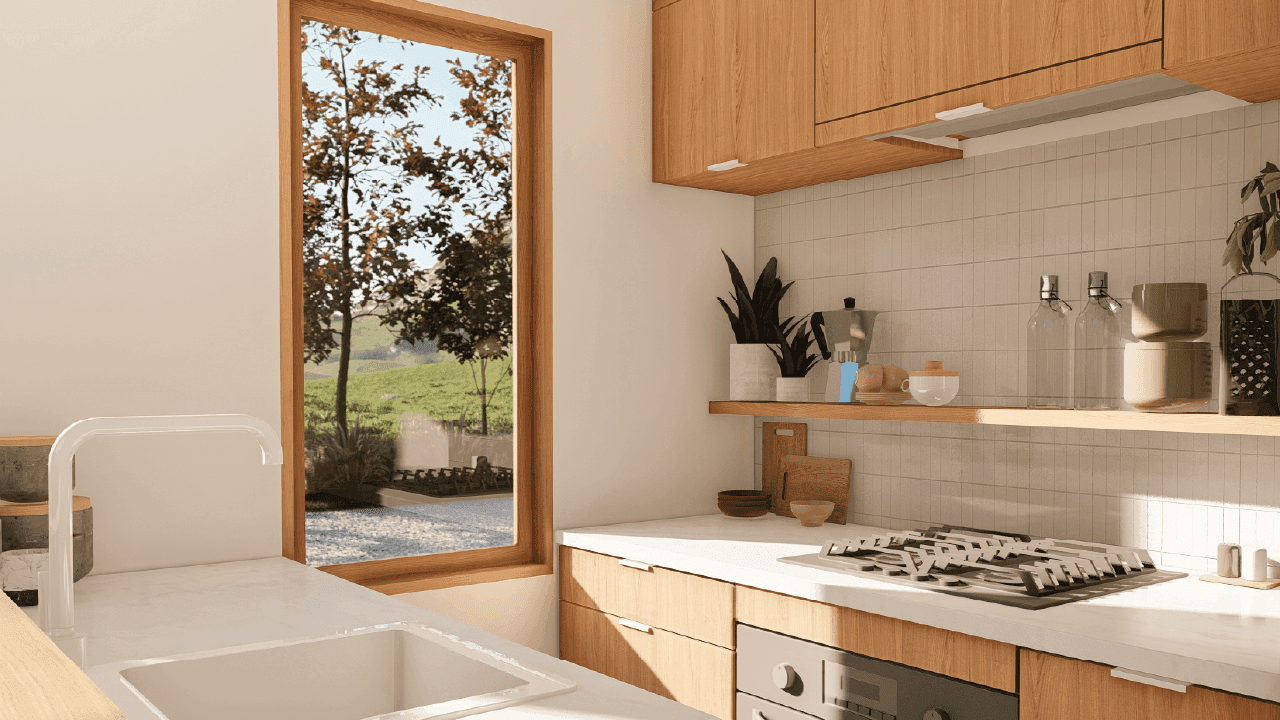 A space-saving tiny house kitchen featuring a full sized sink, 4 plate cook top, full sized oven, standard fridge/freezer, a dishwasher and plenty of drawer and overhead cupboard storage.