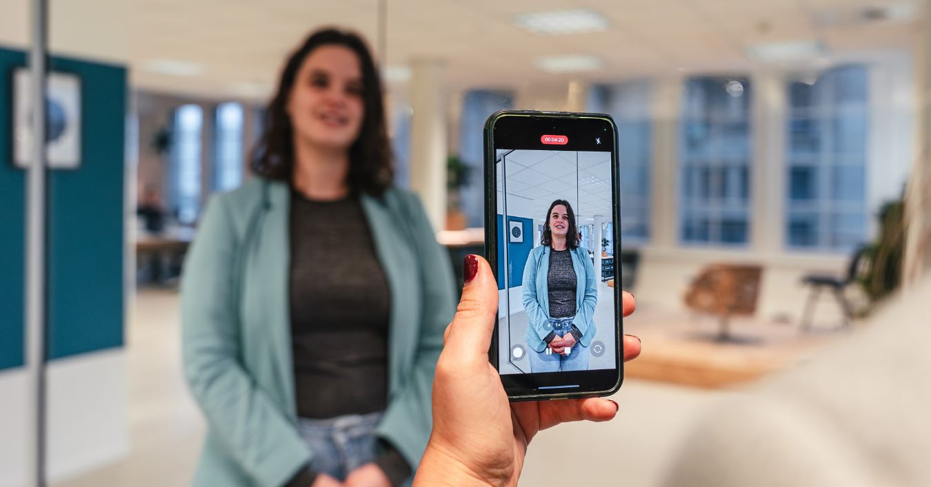 Colleagues filming video content for recruitment