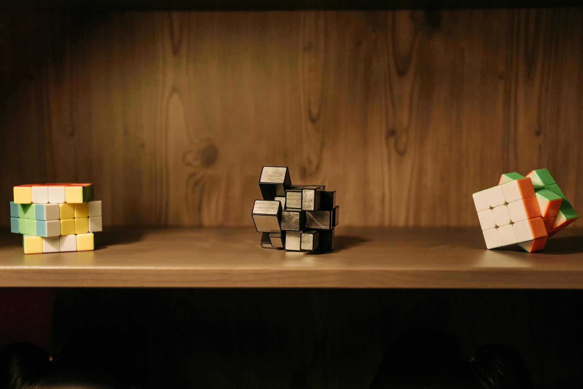 A modern classroom setting with a digital tablet showing an interactive geometry game for young learners.