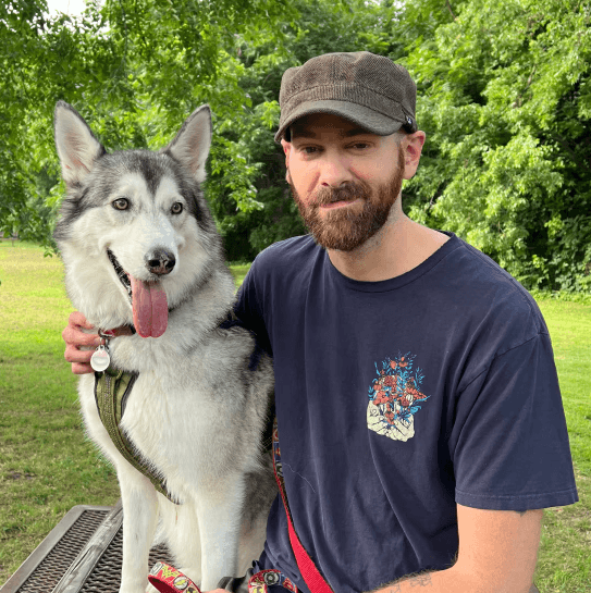 Image of the designer, Donny and his husky Ruby