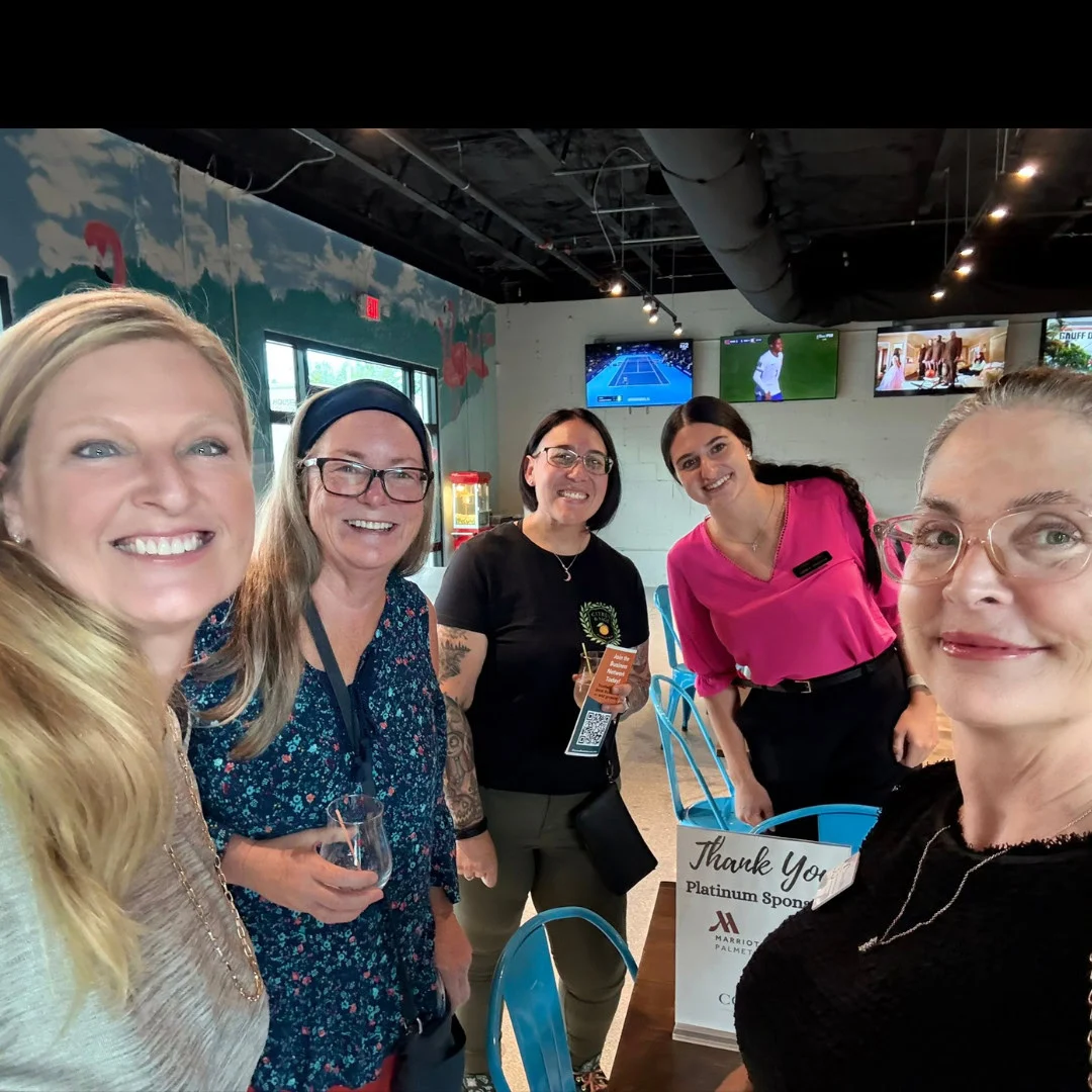 5 people standing in restaurant bradenton