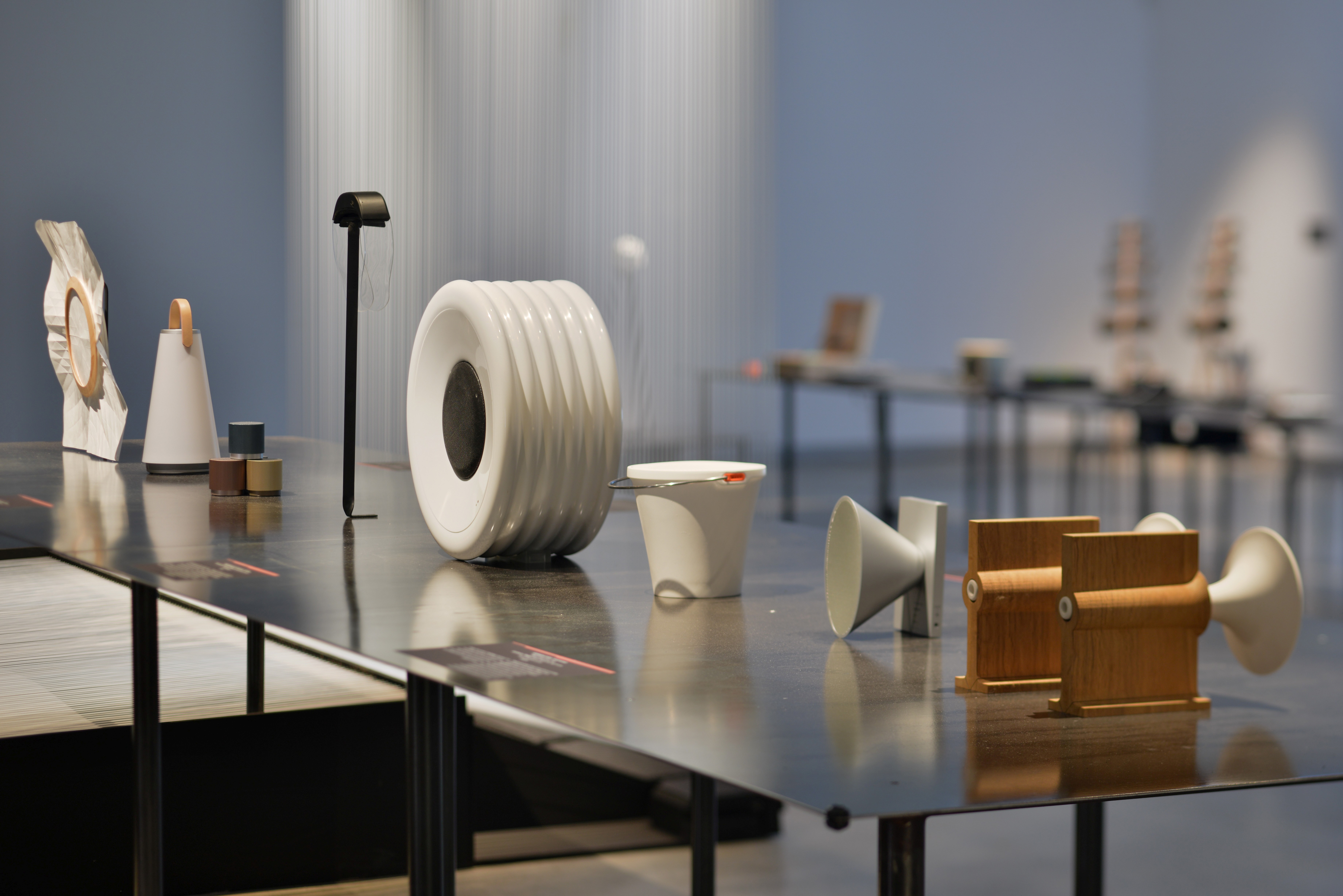 Streetside billboard with flyposters of the Batch.Works brand and illustrations