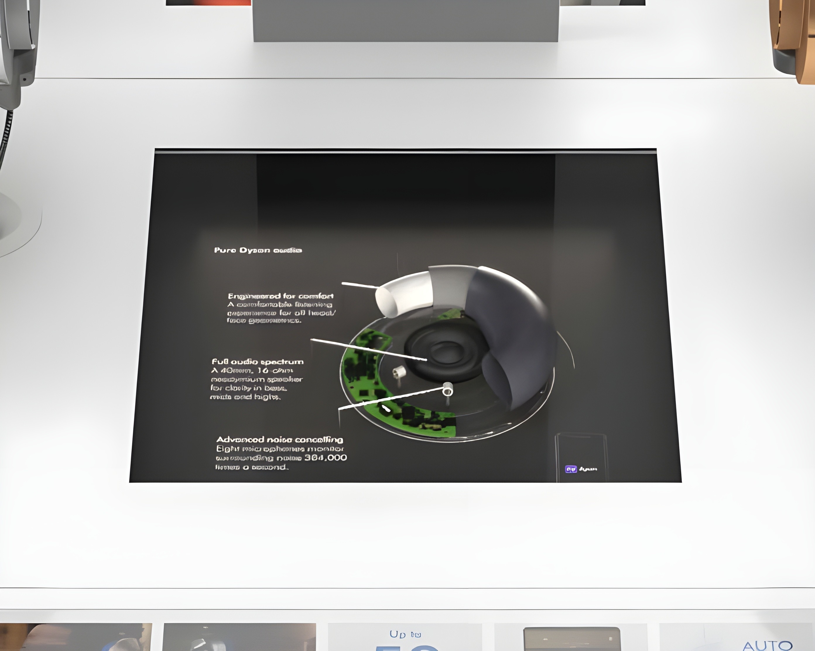 Close Up View of a Dyson Ontrac Retail Fixture showing the Audio Technology inside the Earcup.  Dyson Retail Design Display.