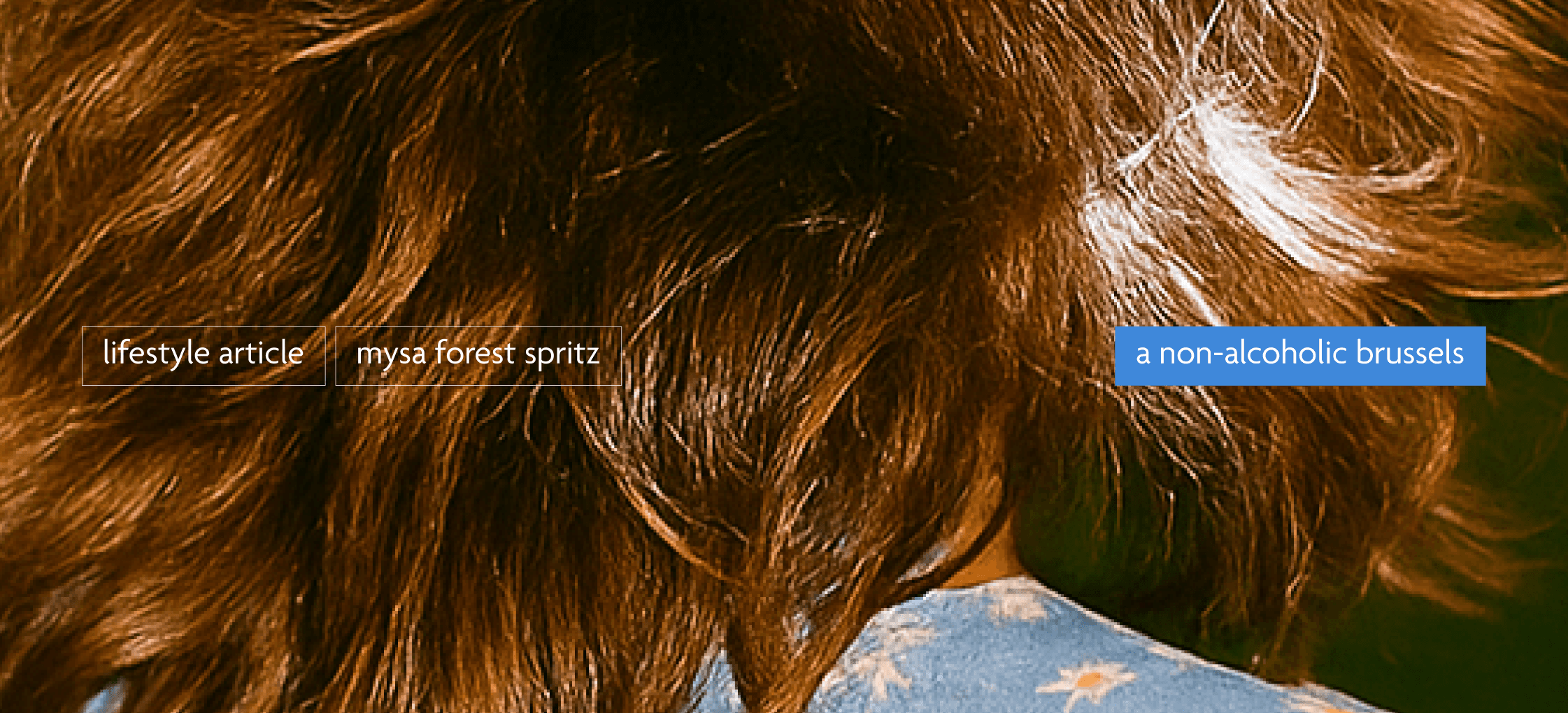 close-up shot of a women hair in a flower dress in golden hour sun