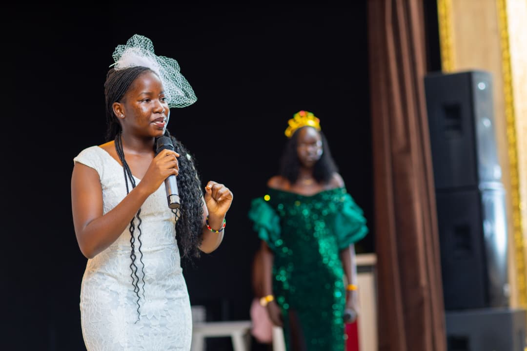 A student stands with a backpack on, ready for school