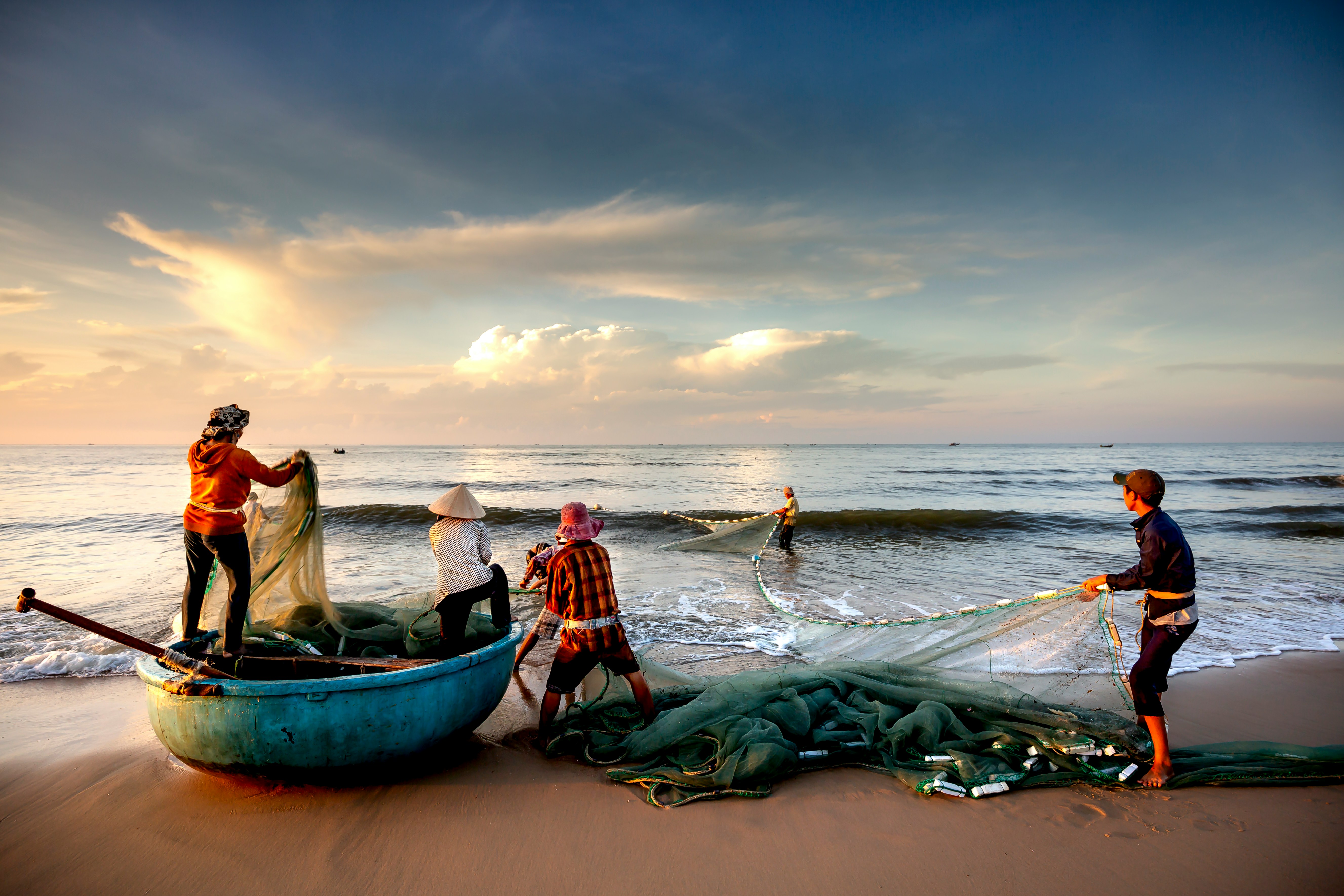 Fishermen pulling fishing net