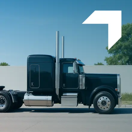 Black semi truck and trailer representing Tractor Trailer Insurance services by GIA Group, LLC