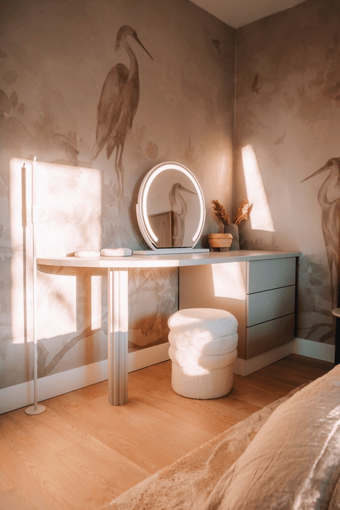 A woman in a straw hat stands in the grass