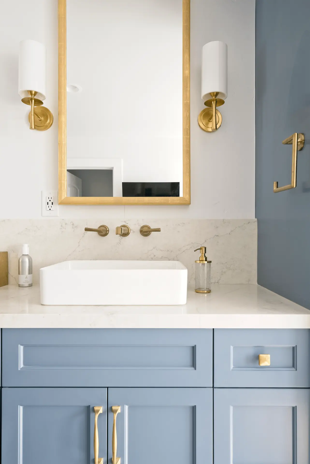 Close-up portrait of the primary bathroom vanity, detailing the fine craftsmanship and elegant design in the Ladera Ranch Remodel. Photo by Todd Huge.