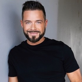 A portrait of a man facing the camera