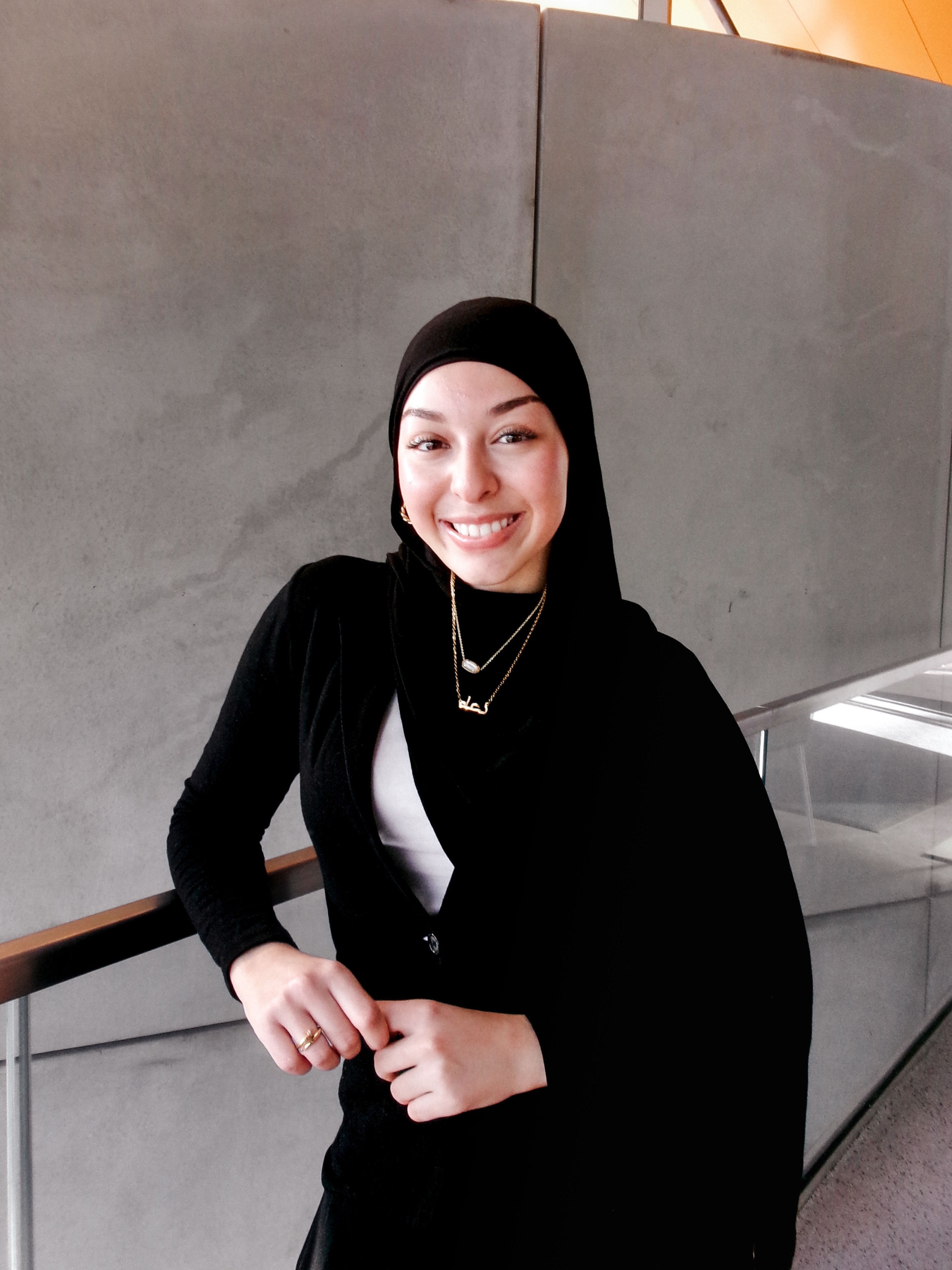 Photographer directing model in a studio setting
