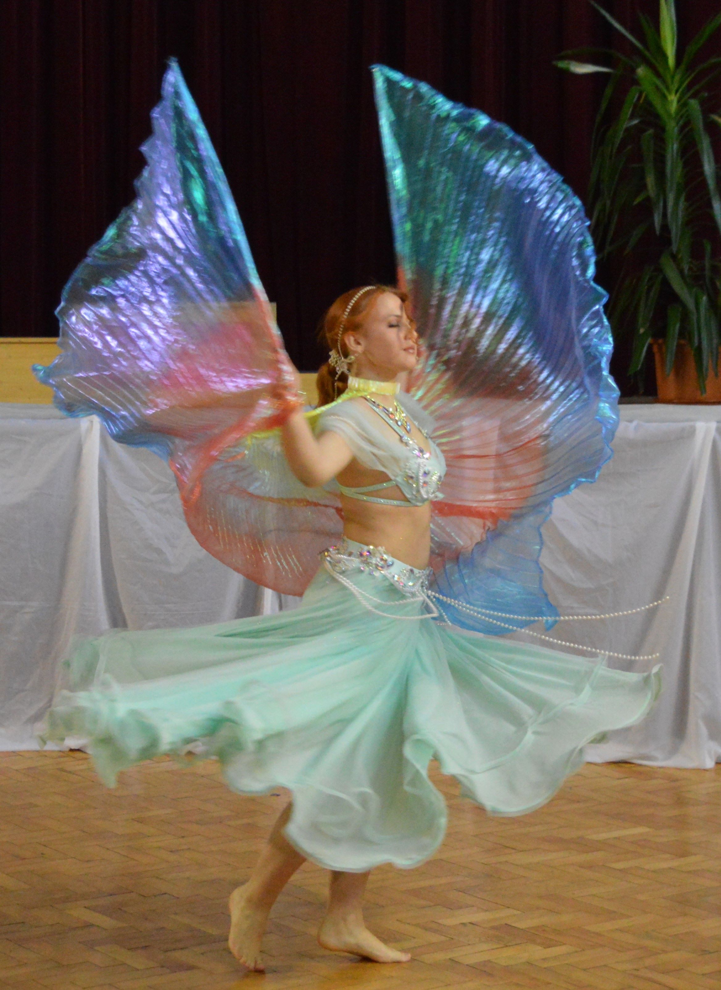 Woman talking to a Man using Mic