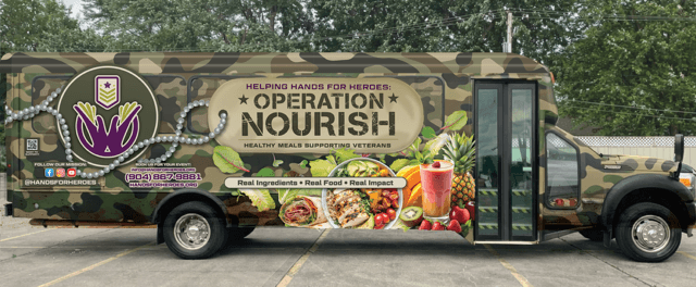 a black and white living room with a large tv