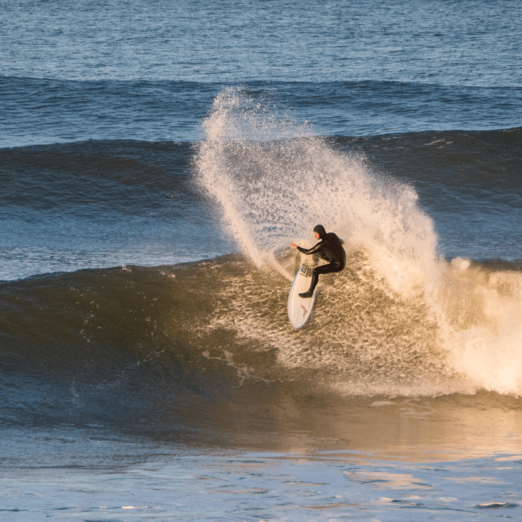 Surfer riding a wave – surfboard rental in san-francisco.