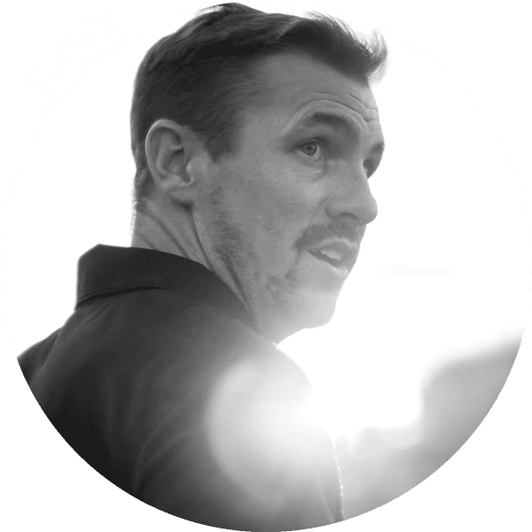 Photo of a white male with lens flare.