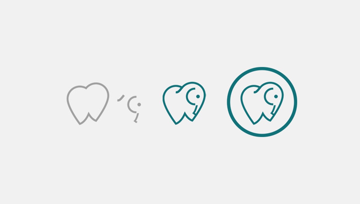 Family standing in a lush green field with tractor.