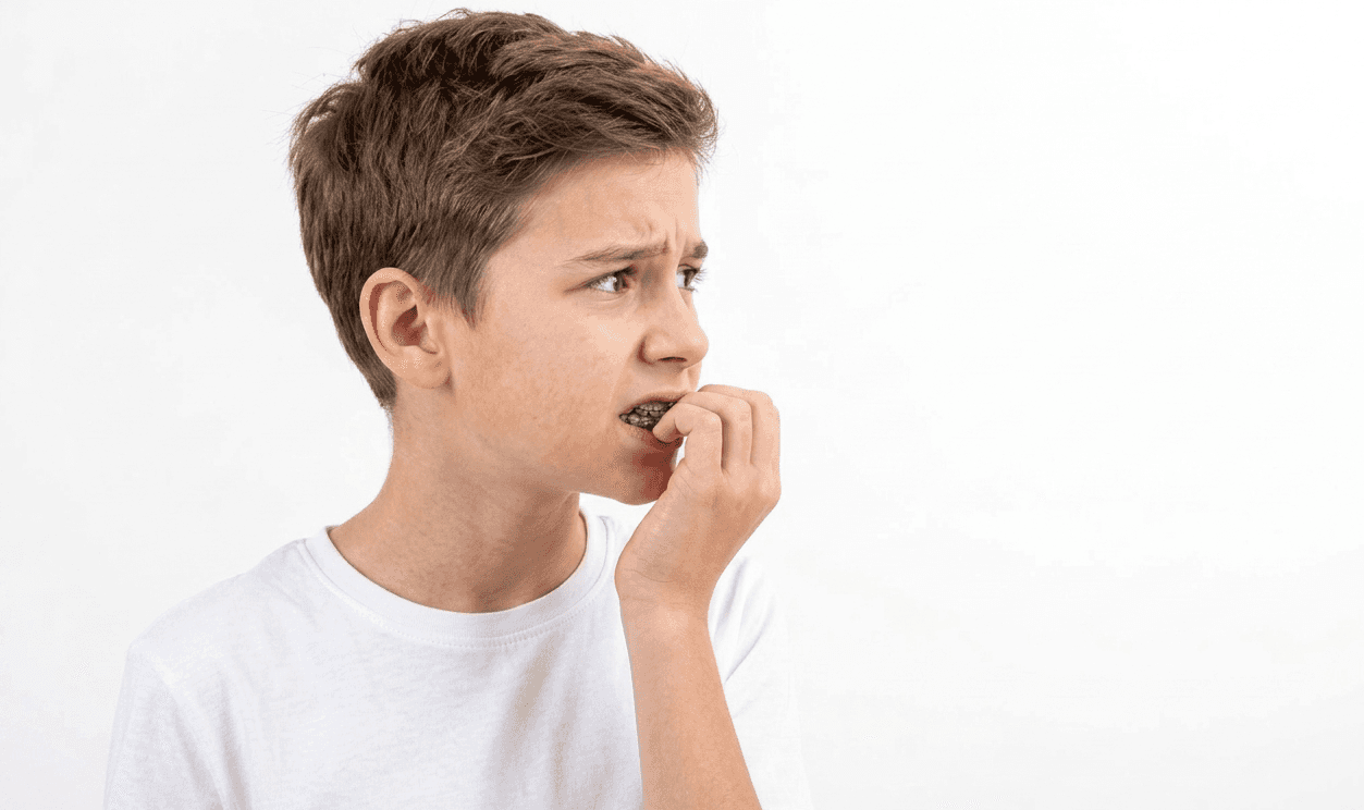 Child biting nails as a habit associated with open bite development in children