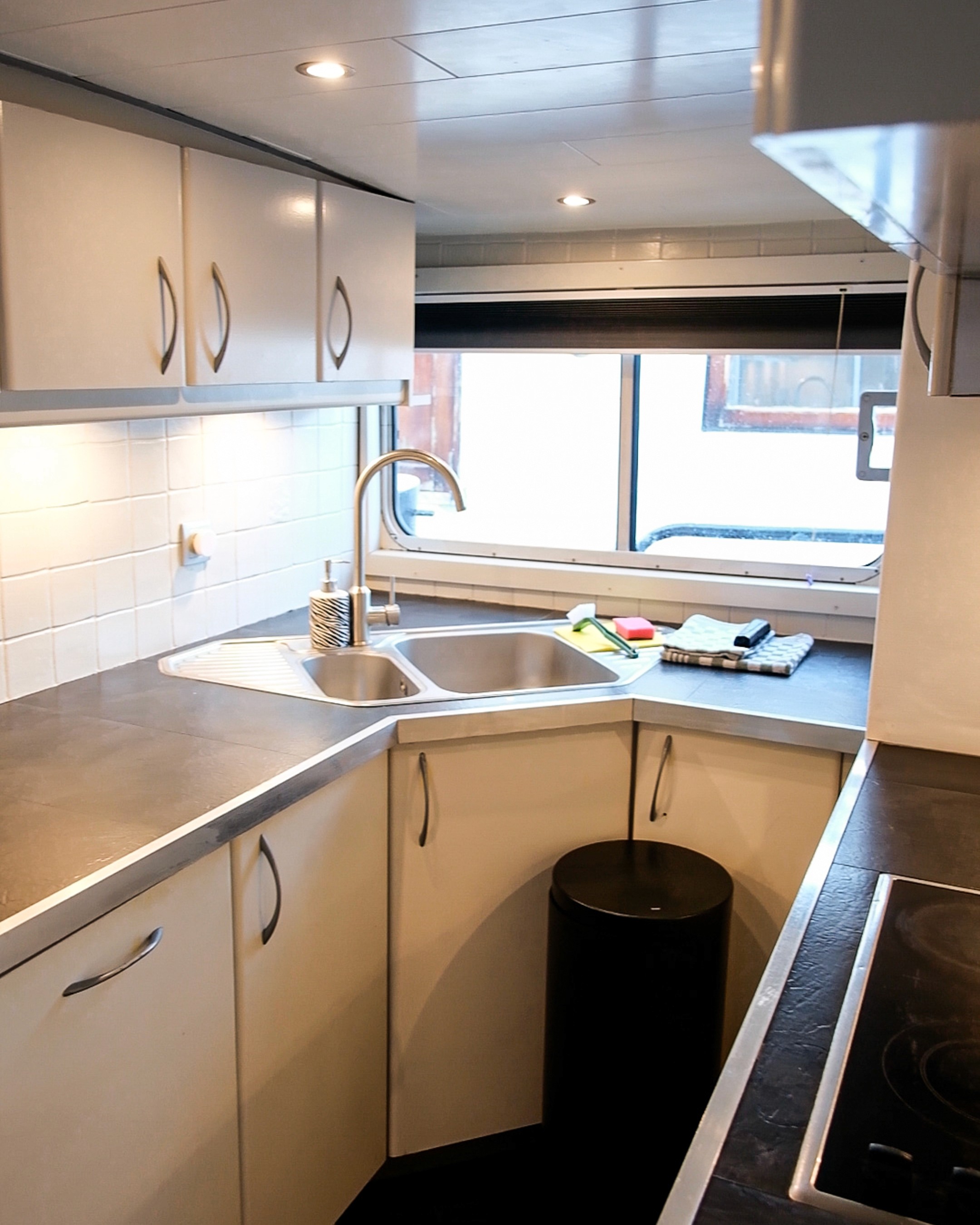 Classic bedroom with canopy bed and patterned pillows