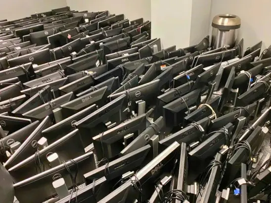 Office decommissioning with removal and stacking of monitors and IT equipment